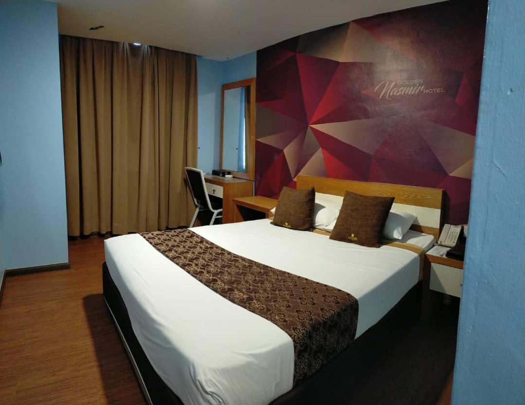 Golden Nasmir Hotel Букит-Мертаджам Экстерьер фото