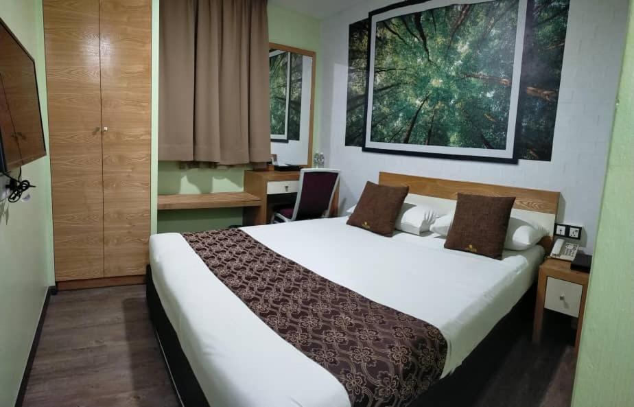 Golden Nasmir Hotel Букит-Мертаджам Экстерьер фото