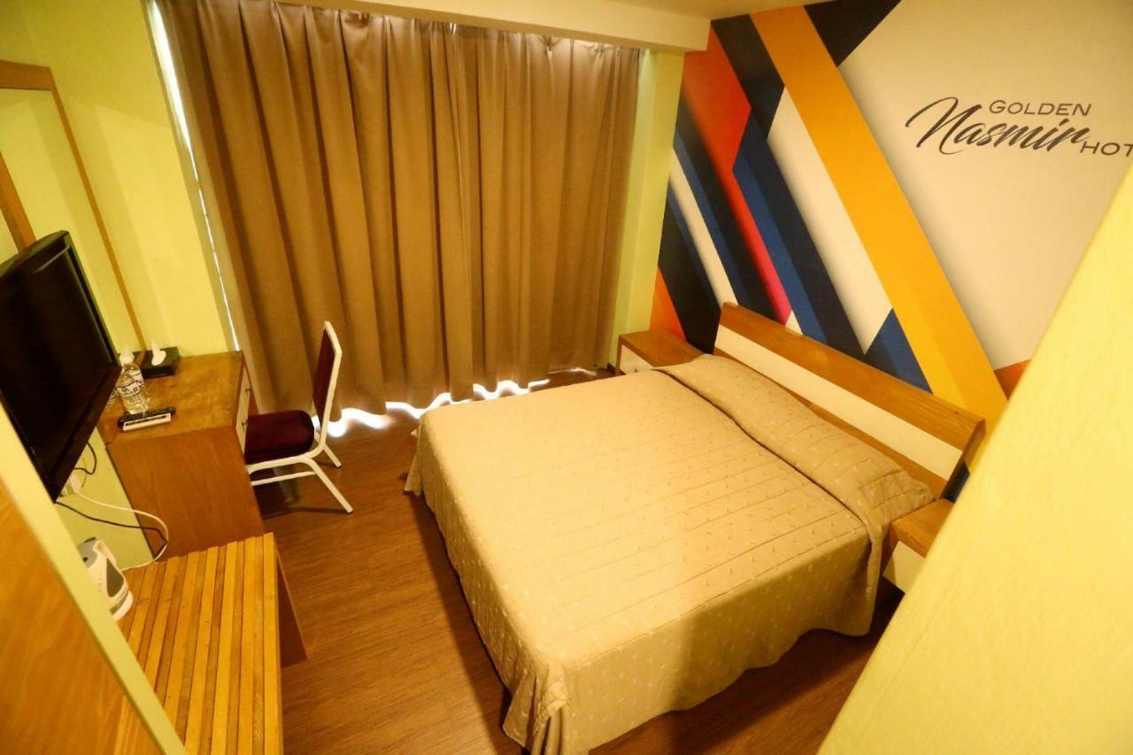 Golden Nasmir Hotel Букит-Мертаджам Экстерьер фото